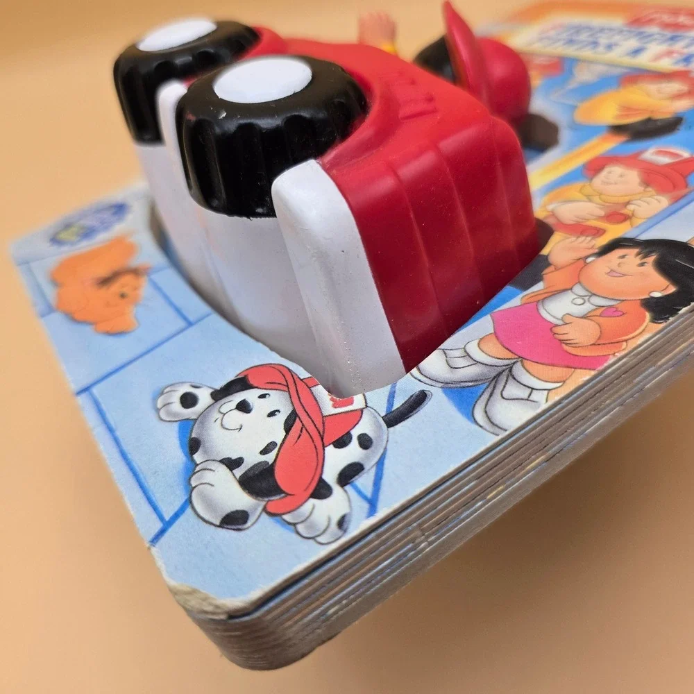Fisher-Price Little People Firefighter Sam Finds a Friend Board Book Toy 1997